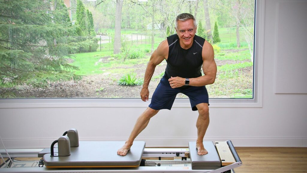 Modern home Pilates setup featuring a Pilates reformer